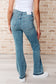 Judy Blue Mid Rise Distressed Released Hem Bootcut Jeans