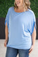 Darcy Dolman Top with trendy flowy sleeves and solid sky blue color, offering superb stretch and comfort for any occasion, from work to evening outings