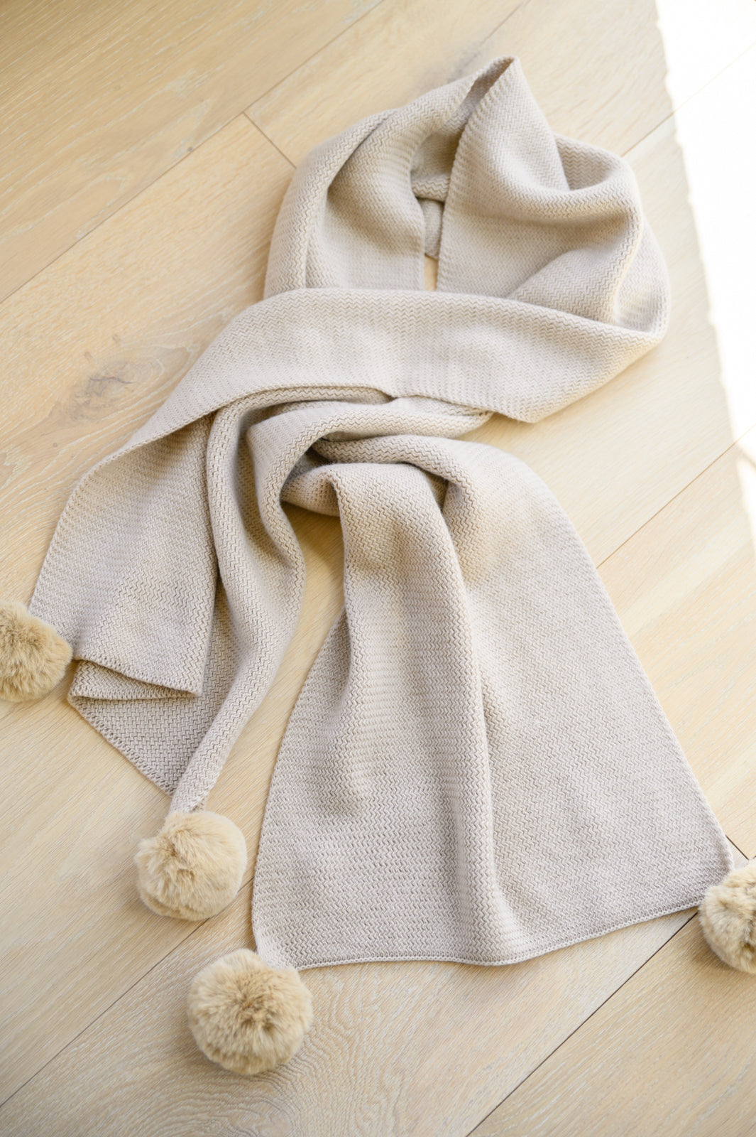 Knitted Fuzzy Pom Pom Scarf In Beige