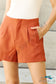 Every Little Thing Pleated High Waisted Shorts In Ochre